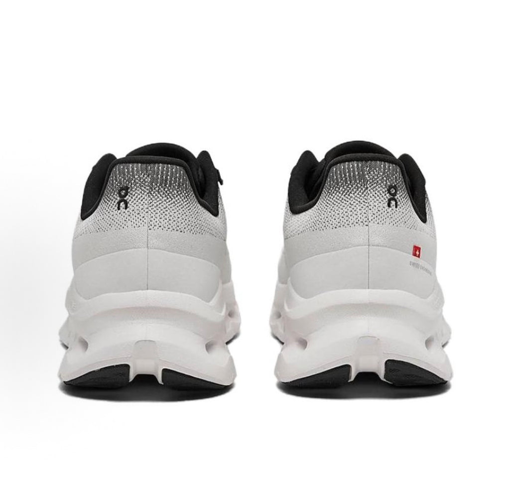 Chaussures de course blanches On Cloudmonster