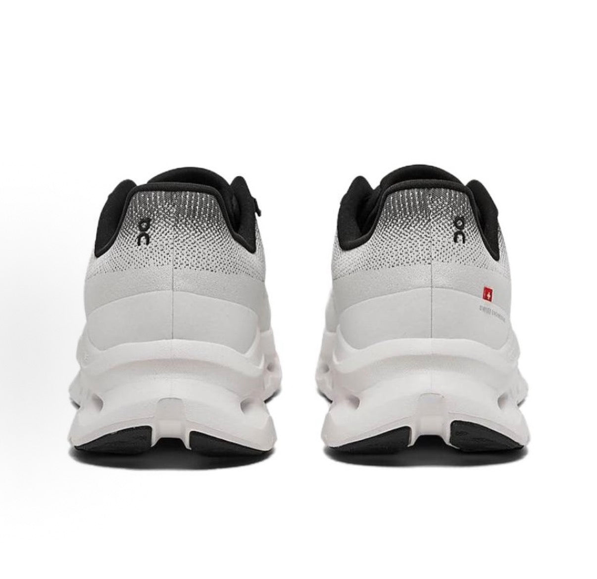 Chaussures de course blanches On Cloudmonster