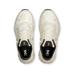 Chaussures de course On Cloudmonster crème et noires